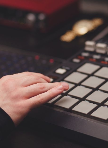 man in the studio creates electronic music